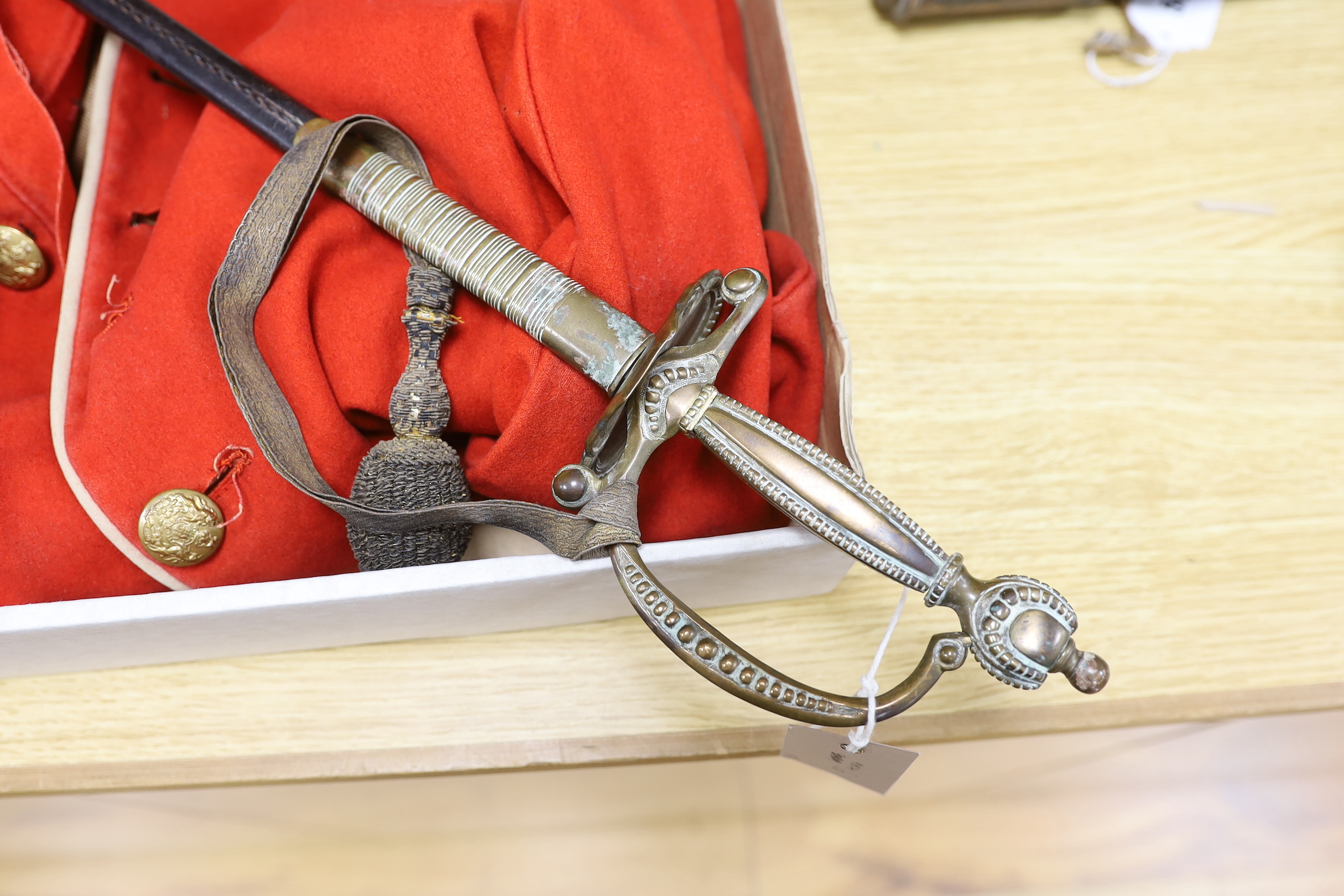 A court sword, in scabbard and a Military bandsman's tunic